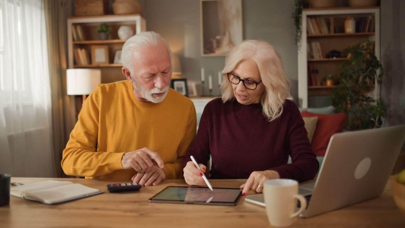 Man and woman reviewing long-term care