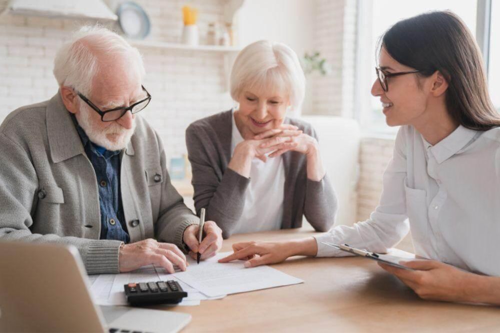 A couple reviewing asset protection strategies with an advisor