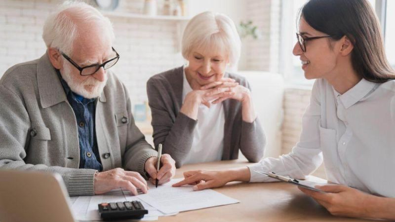 A couple reviewing asset protection strategies with an advisor