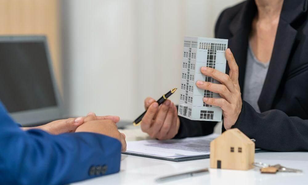 Couple discussing inheritance protection strategies with an advisor