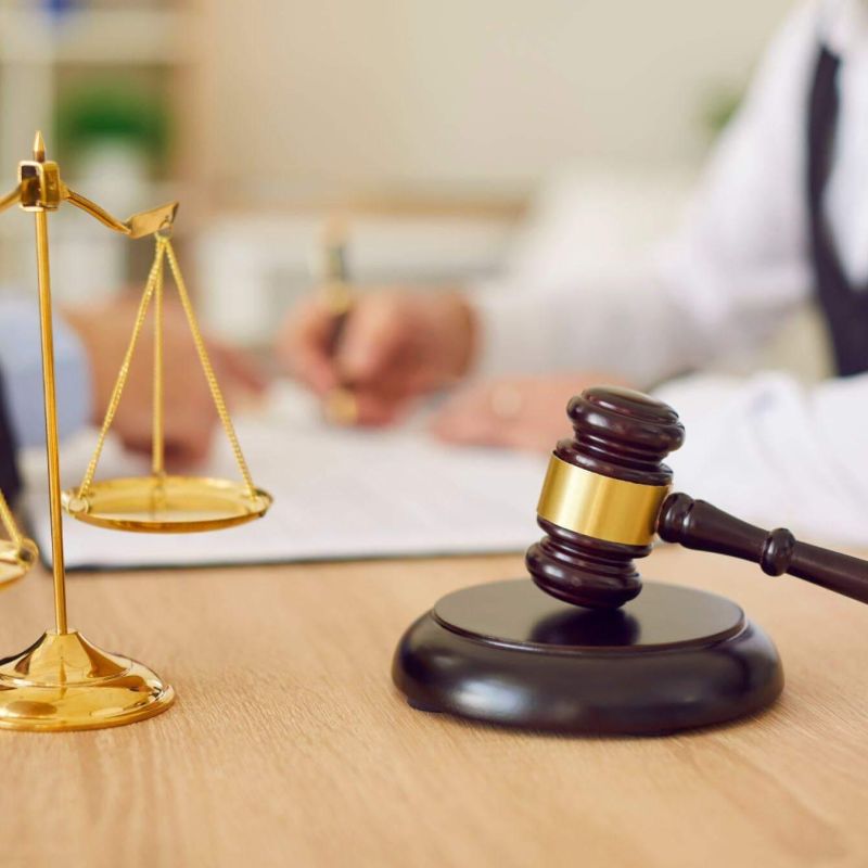 Estate planning attorney with judge's scale illustrating