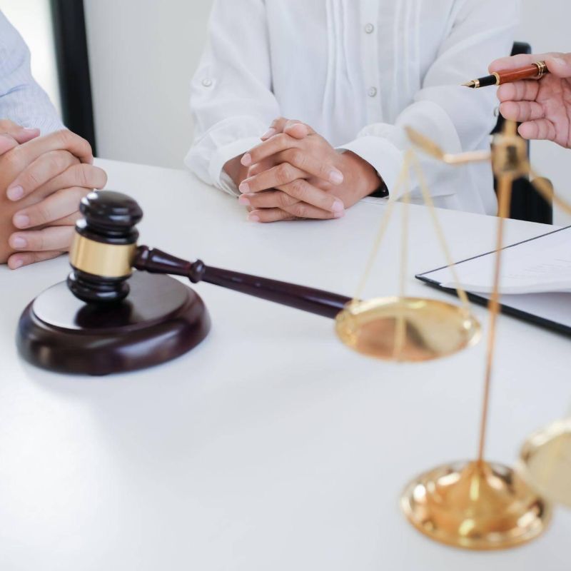 Two people discussing elder law or estate planning