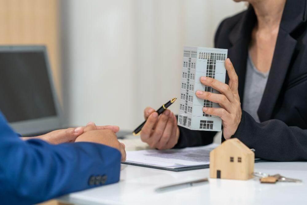 Couple discussing inheritance protection strategies with an advisor