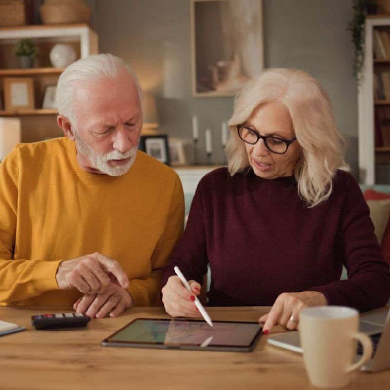Man and woman reviewing long-term care