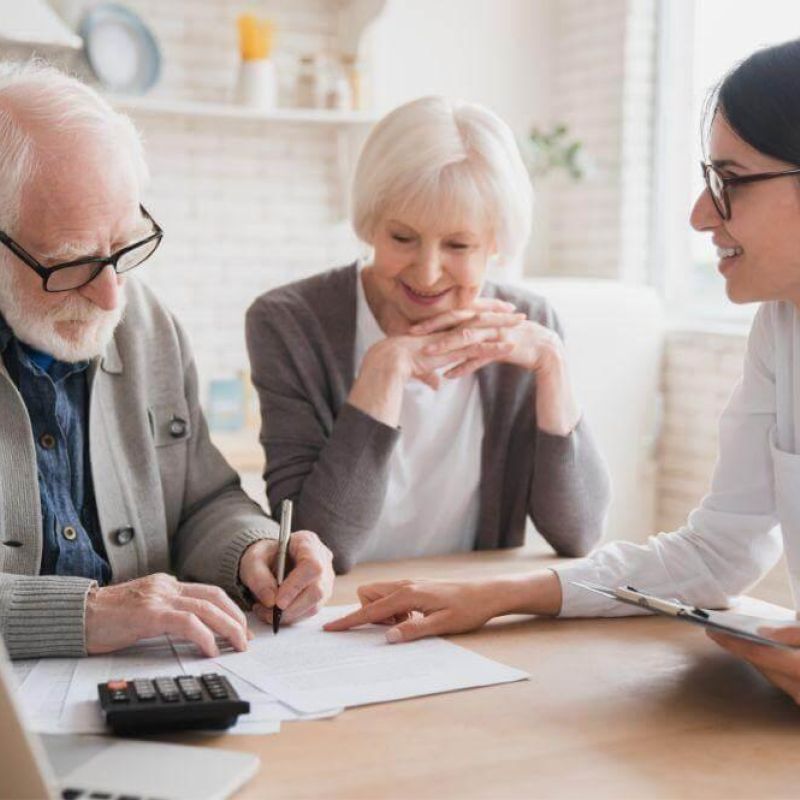 A couple reviewing asset protection strategies with an advisor