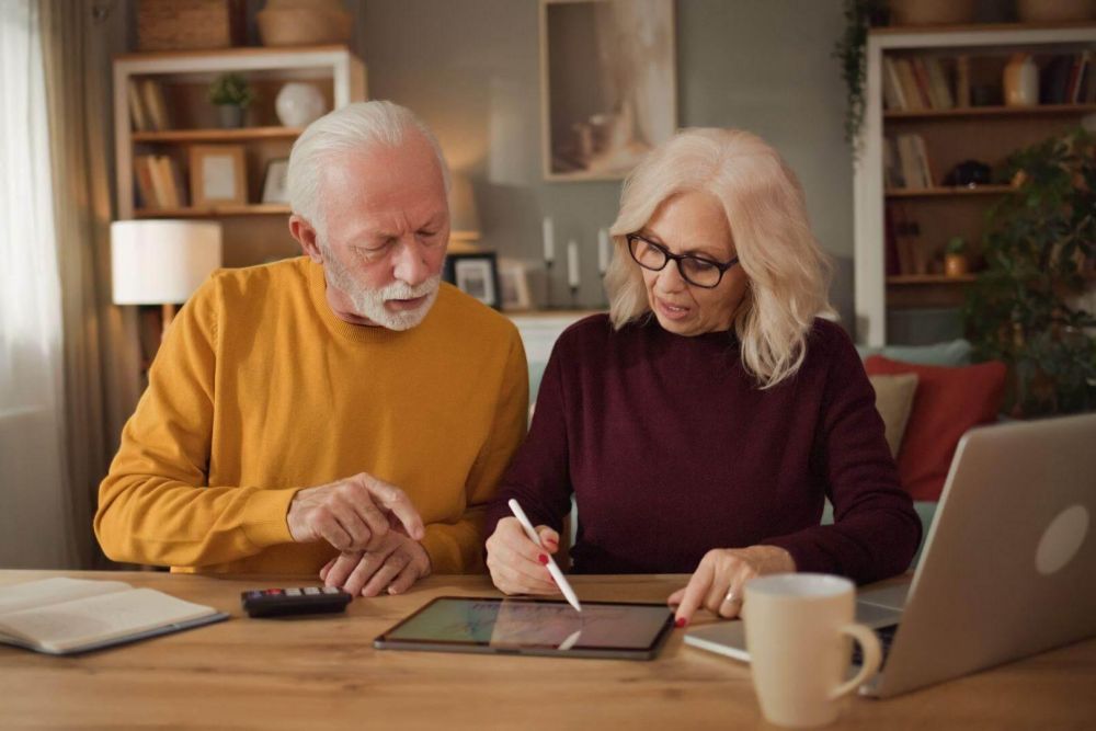 Man and woman reviewing long-term care