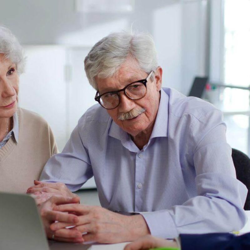 A man and woman consulting with an