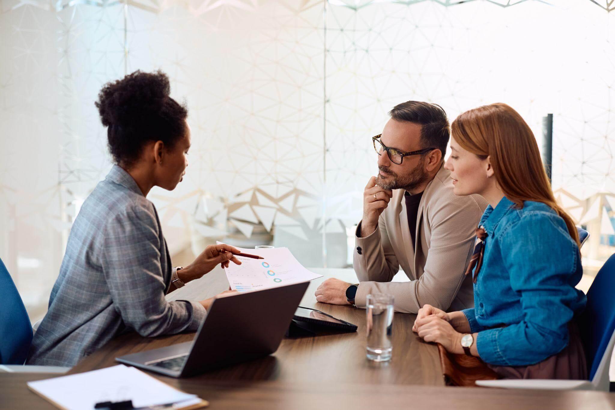 Group of people engaged in estate planning discussion