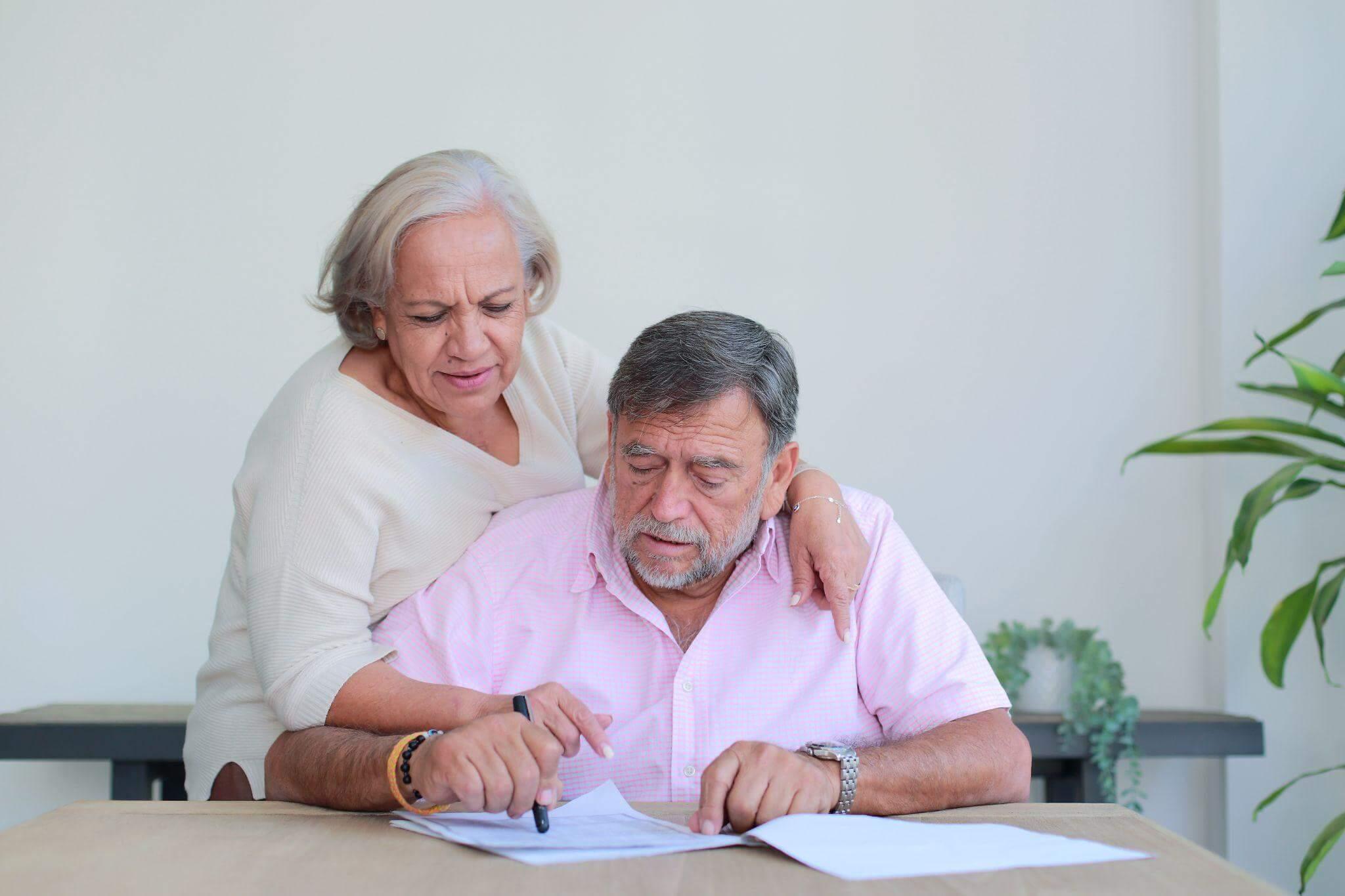 Man and woman reviewing long-term care