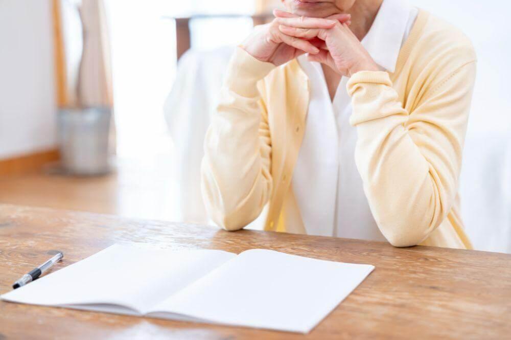 Woman writing about inheritance planning