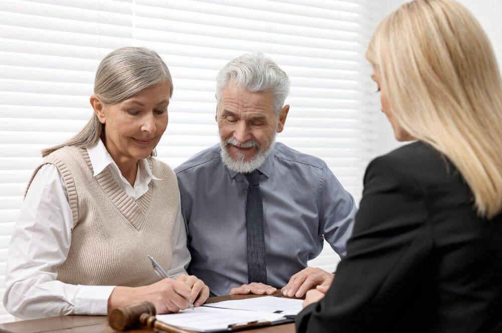 Couple discussing protecting assets from Medicaid at a