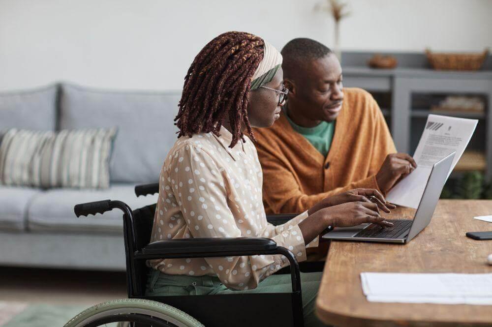 Man and woman reviewing documents on a