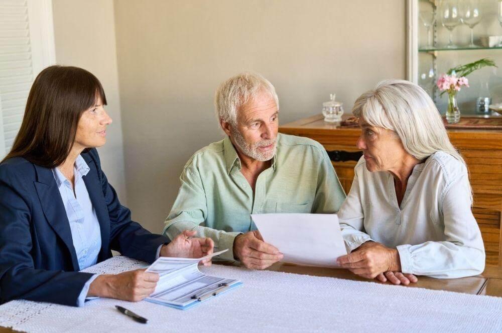 Couple discussing estate planning with an attorney