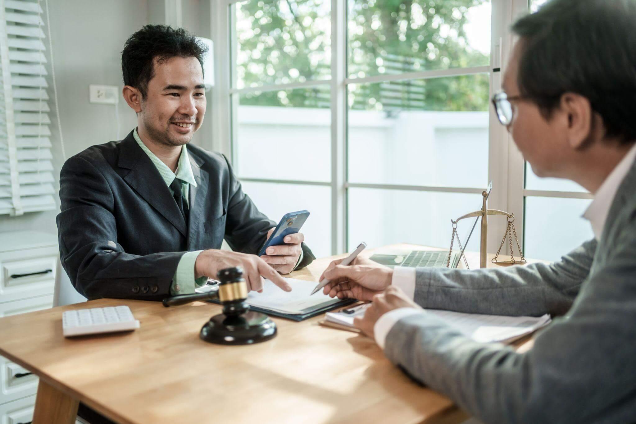 Two men discussing estate planning with executor over
